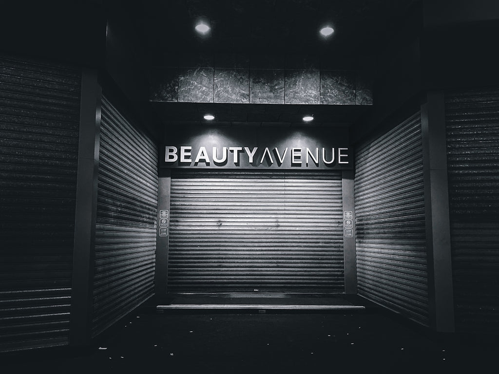 a black and white photo of a closed storage unit