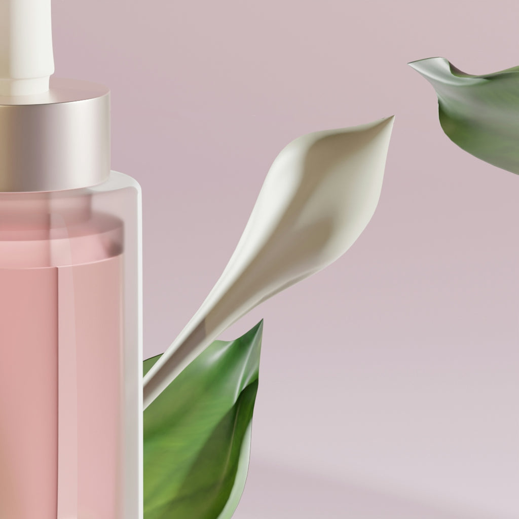 a close up of a bottle of liquid and a plant