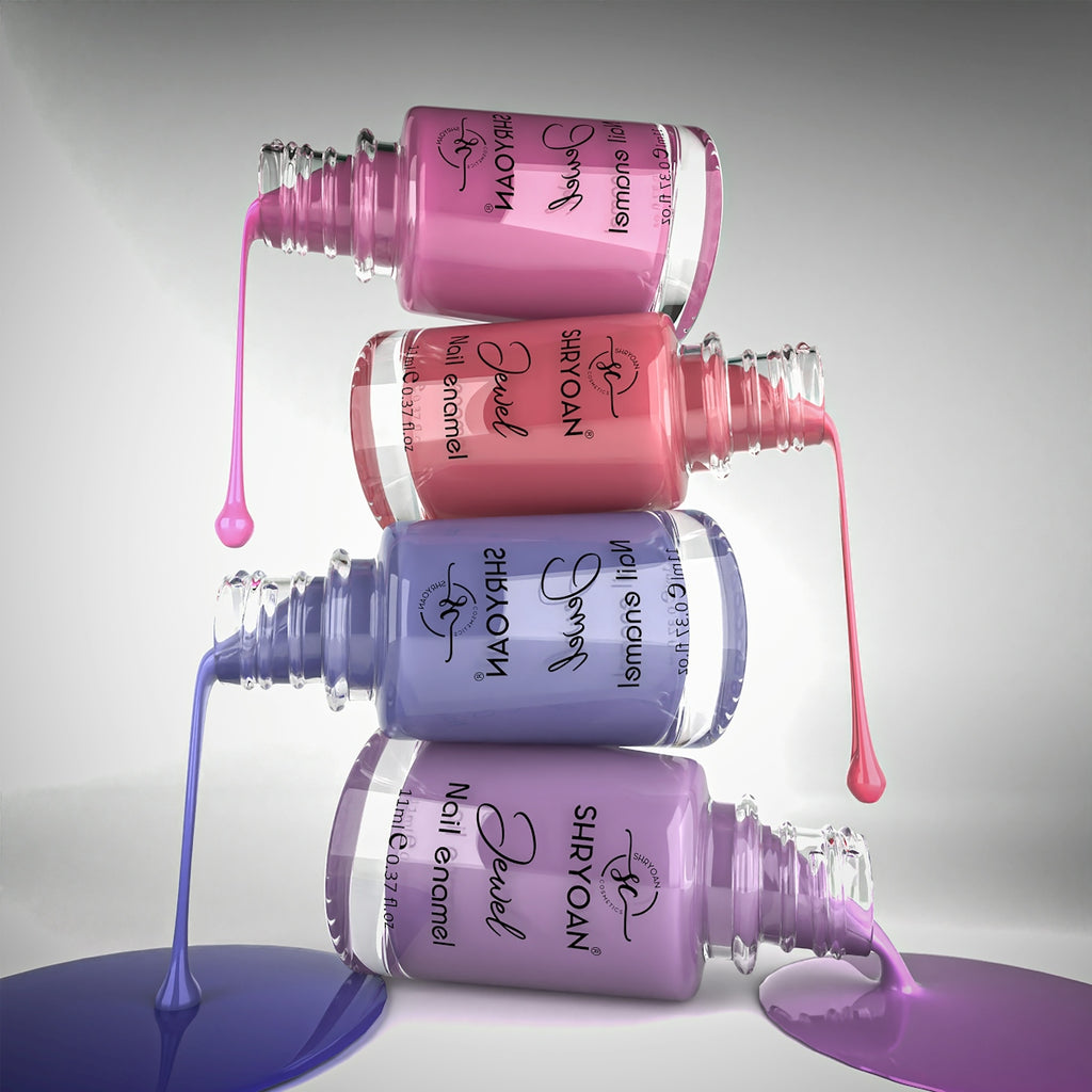 Stack of nail polish bottles with dripping polish