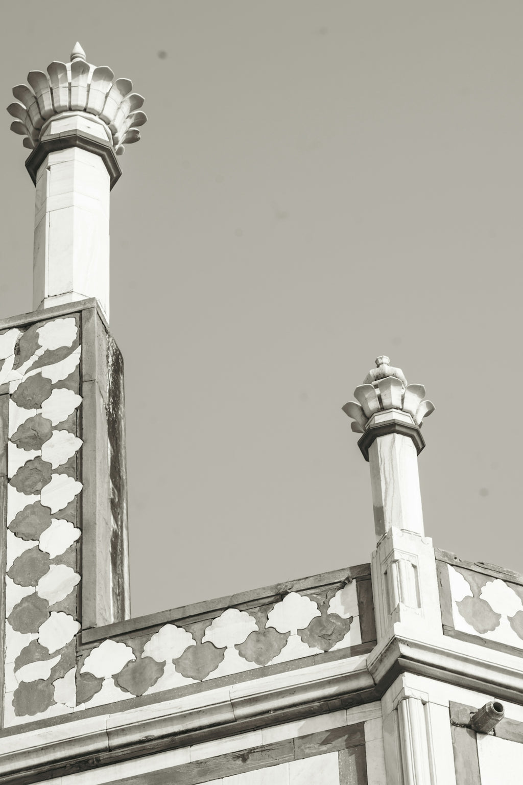 Architectural detail of minarets against sky