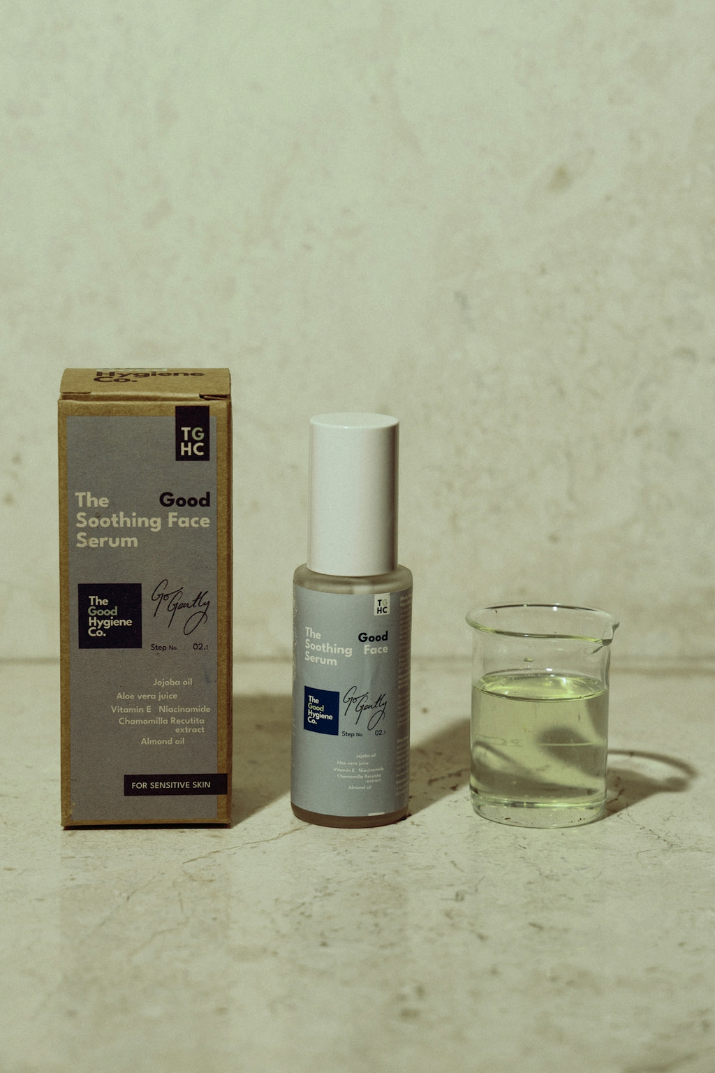 Skincare serum bottle with box and liquid sample